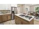 Modern kitchen with stainless steel appliances and an island at 1510 Mims Sw St, Atlanta, GA 30314
