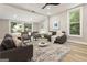 Bright and airy living room with hardwood floors and large windows at 1510 Mims Sw St, Atlanta, GA 30314