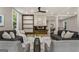 Open concept living room with built-in shelving and fireplace at 1510 Mims Sw St, Atlanta, GA 30314