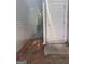 Side entrance with white door and small yard space at 449 Kara Ln, Mcdonough, GA 30253