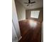 Bright bedroom with hardwood floors and ceiling fan at 449 Kara Ln, Mcdonough, GA 30253