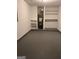 Unfinished basement with shelving and water heater at 449 Kara Ln, Mcdonough, GA 30253