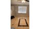 Living room with tiled floor and large window at 449 Kara Ln, Mcdonough, GA 30253