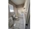 Bathroom with a bathtub, toilet and small vanity at 449 Kara Ln, Mcdonough, GA 30253