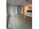 Bright dining area with tile floors and access to patio at 449 Kara Ln, Mcdonough, GA 30253