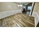 Dining room with wood floors and wainscoting at 314 Sable Trace Pass, Acworth, GA 30102