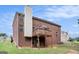 Brick house with a deck and a nicely landscaped yard at 132 Sunflower Meadows Dr, Mcdonough, GA 30252