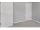 Empty bedroom with gray walls and carpet flooring at 132 Sunflower Meadows Dr, Mcdonough, GA 30252