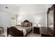 Spacious bedroom with a large bed, nightstands, and a dresser at 132 Sunflower Meadows Dr, Mcdonough, GA 30252
