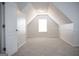 Simple bedroom with gray walls and carpet flooring at 132 Sunflower Meadows Dr, Mcdonough, GA 30252