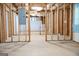 Unfinished basement with exposed framing, electrical wiring, and plumbing at 132 Sunflower Meadows Dr, Mcdonough, GA 30252