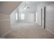 Large bedroom with vaulted ceiling, carpet, and window at 132 Sunflower Meadows Dr, Mcdonough, GA 30252