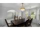 Formal dining room with a chandelier, and seating for six at 132 Sunflower Meadows Dr, Mcdonough, GA 30252
