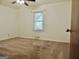 Bedroom with carpeted floor and a window with blinds at 2093 Wildrose Dr, Decatur, GA 30032