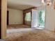 Living room with window, door, and pink curtains at 2093 Wildrose Dr, Decatur, GA 30032