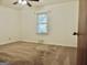 Bedroom with carpeted floor and a window with blinds at 2093 Wildrose Dr, Decatur, GA 30032
