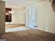 Simple dining room with carpet, chandelier, and built-in hutch at 2093 Wildrose Dr, Decatur, GA 30032
