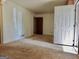 Spacious living room with large windows and door at 2093 Wildrose Dr, Decatur, GA 30032
