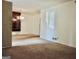 Simple dining room with carpet, chandelier, and built-in hutch at 2093 Wildrose Dr, Decatur, GA 30032