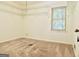 Bedroom with white walls, carpeted floor and wire shelving at 2093 Wildrose Dr, Decatur, GA 30032