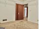 Bedroom with closet, carpeted floor and door to another room at 2093 Wildrose Dr, Decatur, GA 30032