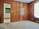 Bedroom with wood paneling walls and carpeted floor at 2093 Wildrose Dr, Decatur, GA 30032