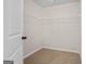 Large walk-in closet with wire shelving at 5717 Laney Dr, Rex, GA 30273