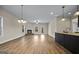 Spacious living room featuring a corner fireplace and hardwood floors at 5716 Laney Dr, Rex, GA 30273