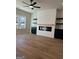 Living room with fireplace and built-in shelving at 4127 James Lake Dr, Conley, GA 30288