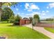 Community tennis court and nearby shed at 12 Fairway Ln, Peachtree City, GA 30269