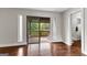 Spacious bedroom with wood floors and access to private deck at 12 Fairway Ln, Peachtree City, GA 30269