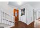 Convenient laundry area with washer and dryer in the entryway at 12 Fairway Ln, Peachtree City, GA 30269