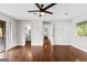 Large bedroom with hardwood floors, private bath access, and walk-in closet at 12 Fairway Ln, Peachtree City, GA 30269