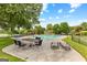 Community pool with patio furniture at 12 Fairway Ln, Peachtree City, GA 30269