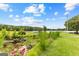 Scenic lakefront view with grassy area at 12 Fairway Ln, Peachtree City, GA 30269