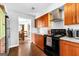 Updated kitchen featuring granite countertops and stainless steel appliances at 12 Fairway Ln, Peachtree City, GA 30269
