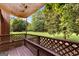 Private deck with wooded views and shade cover at 12 Fairway Ln, Peachtree City, GA 30269