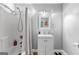 Clean bathroom with white vanity and shower/tub combo at 12 Fairway Ln, Peachtree City, GA 30269