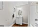 Clean bathroom with updated vanity, tile floors, and bathtub at 12 Fairway Ln, Peachtree City, GA 30269