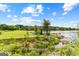 Lake access with kayaks and a dock at 12 Fairway Ln, Peachtree City, GA 30269