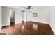 Bright bedroom featuring hardwood floors and ample closet space at 12 Fairway Ln, Peachtree City, GA 30269
