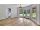 Bright dining area with hardwood floors and access to a deck at 2752 Poplar Rd, Sharpsburg, GA 30277