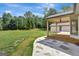 Covered patio with a view of the backyard at 2752 Poplar Rd, Sharpsburg, GA 30277