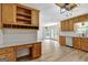 Updated kitchen with wood cabinets, granite counters, and stainless steel appliances at 2752 Poplar Rd, Sharpsburg, GA 30277