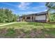 Ranch home with stone accents and a covered porch at 2752 Poplar Rd, Sharpsburg, GA 30277