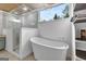 Modern bathroom with a soaking tub and glass shower at 2752 Poplar Rd, Sharpsburg, GA 30277