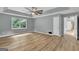 Spacious bedroom with wood-look floors and ceiling fan at 2752 Poplar Rd, Sharpsburg, GA 30277