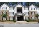Two-story apartment building with brick and siding exterior at 8201 Fairington Village Dr, Lithonia, GA 30038