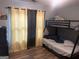 Bedroom with a bunk bed and plenty of natural light at 8201 Fairington Village Dr, Lithonia, GA 30038