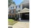 Two story building with brick and siding exterior at 8201 Fairington Village Dr, Lithonia, GA 30038